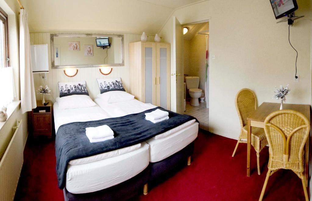 Guesthouse De Zonnestraal De Koog  Rom bilde